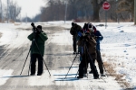 RA Photo Club members watching a Snowy Owl